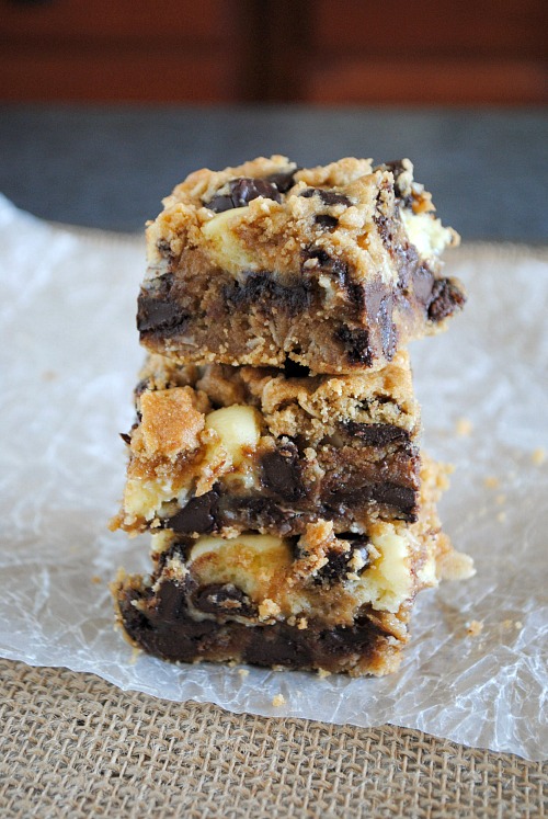 Peanut butter chocolate chip cookie cheesecake bars | you-made-that.com